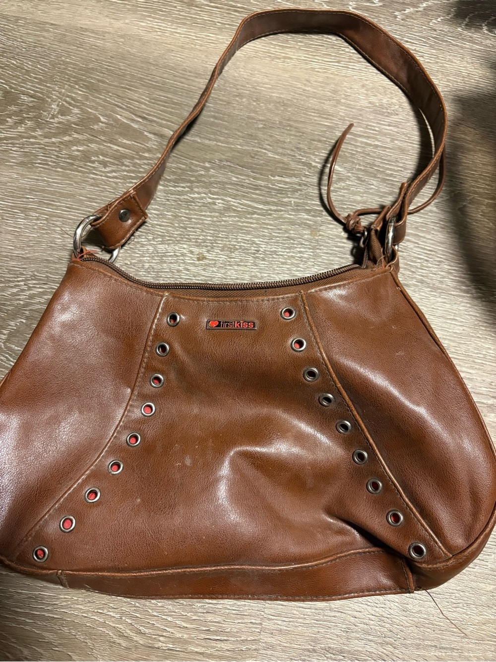 Brown Leather Shoulder Bag with Grommet Accents